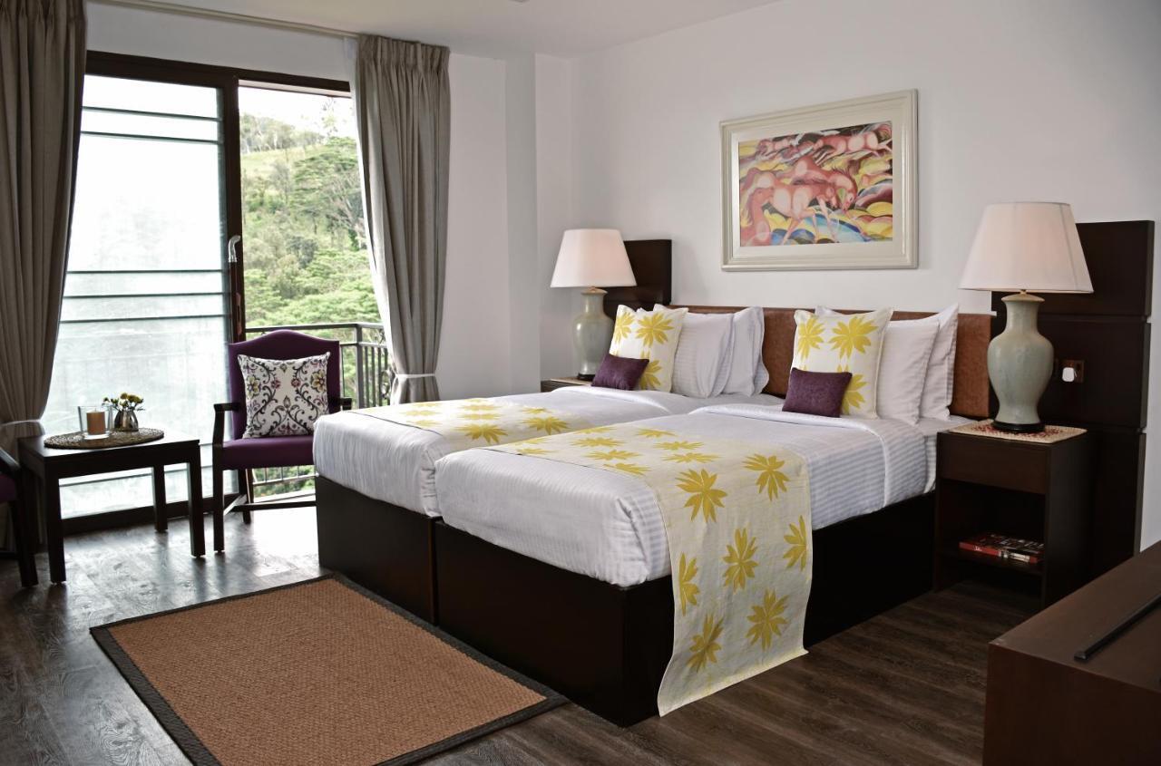폭스 칸디 바이 폭스 리조트 캔디 외부 사진 A bedroom at the hotel
